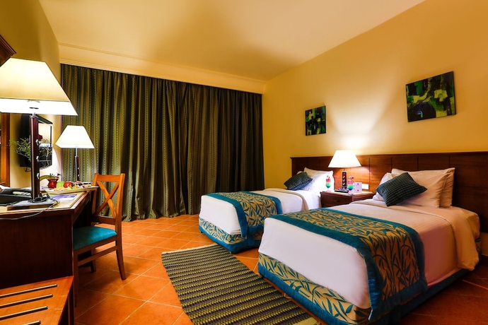 Imagen de la habitación del Hotel Charmillion Club Aqua Park. Foto 5