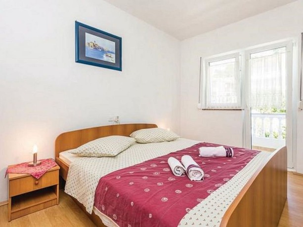 Imagen de la habitación del Hotel Charming Apartments House in Rab to 17 Persons. Foto 1