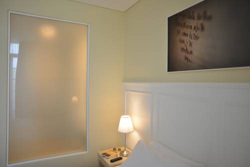 Imagen de la habitación del Hotel Charming Blue. Foto 7