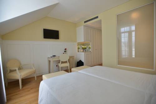 Imagen de la habitación del Hotel Charming Blue. Foto 13