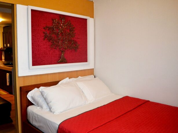 Imagen de la habitación del Hotel Charming Couples Condo. Foto 10