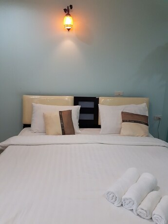 Imagen de la habitación del Hotel Charming Home Resort. Foto 21