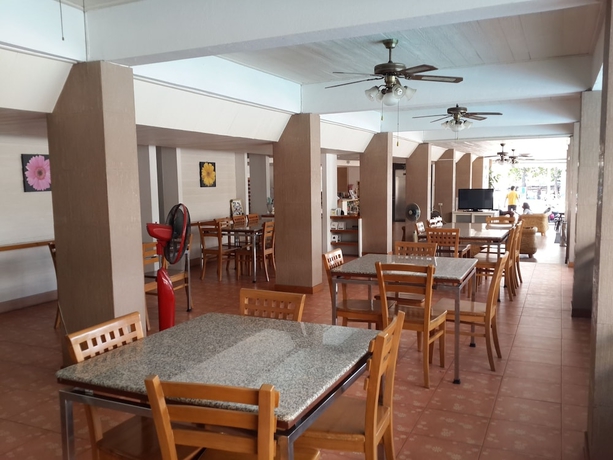 Imagen del bar/restaurante del Hotel Charming Inn. Foto 2
