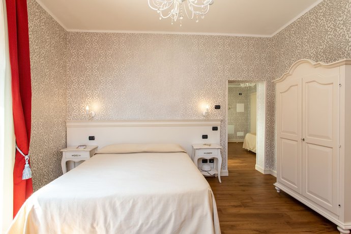 Imagen de la habitación del Hotel Charming Palace Santa Fosca. Foto 9