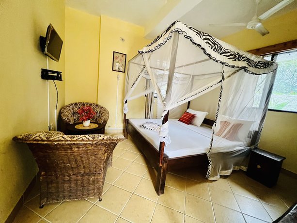Imagen de la habitación del Hotel Charming and Remarkable15-bed Villa in Diani Beach. Foto 15