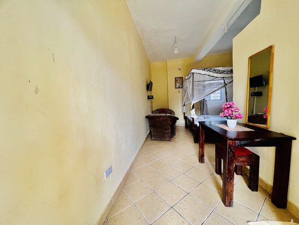 Imagen de la habitación del Hotel Charming and Remarkable15-bed Villa in Diani Beach. Foto 17