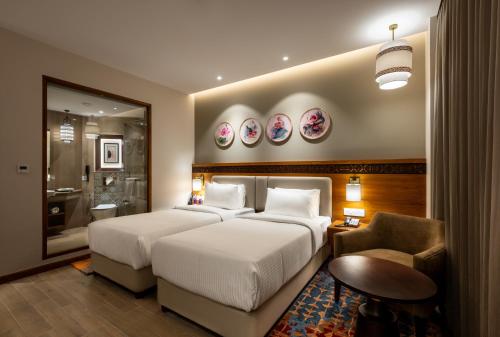 Imagen de la habitación del Hotel Charmwood. Foto 18