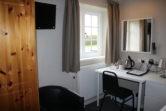 Imagen de la habitación del Hotel Charney Manor. Foto 15