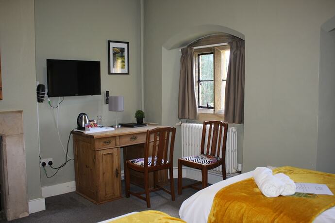 Imagen de la habitación del Hotel Charney Manor. Foto 19