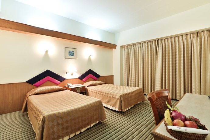 Imagen de la habitación del Hotel Charoen. Foto 3