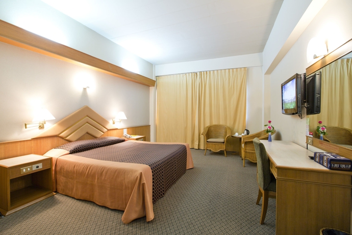Imagen de la habitación del Hotel Charoen. Foto 4