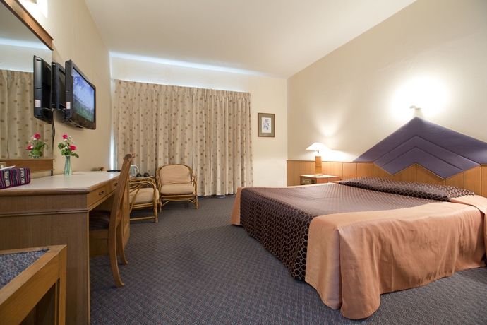 Imagen de la habitación del Hotel Charoen. Foto 5