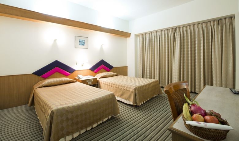 Imagen de la habitación del Hotel Charoen. Foto 6