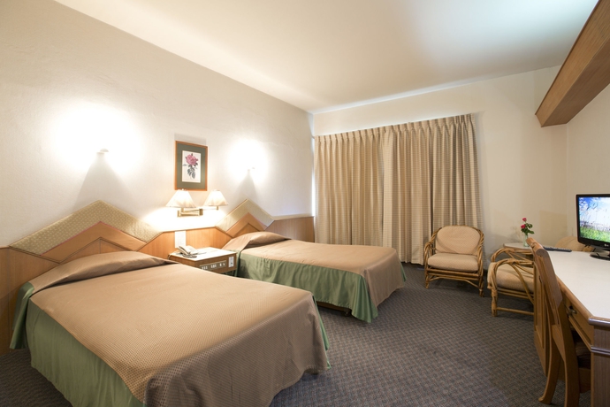 Imagen de la habitación del Hotel Charoen. Foto 7