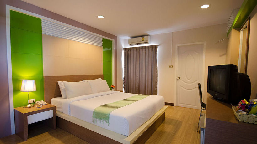 Imagen de la habitación del Hotel Charoenchit House. Foto 4