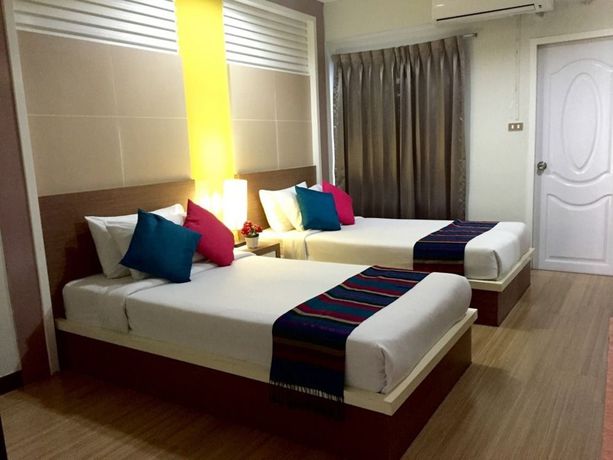 Imagen de la habitación del Hotel Charoenchit House. Foto 7