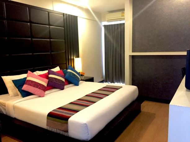 Imagen de la habitación del Hotel Charoenchit House. Foto 8