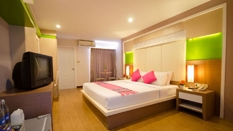 Imagen de la habitación del Hotel Charoenchit House. Foto 10