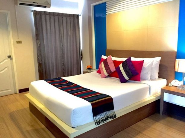 Imagen de la habitación del Hotel Charoenchit House. Foto 11