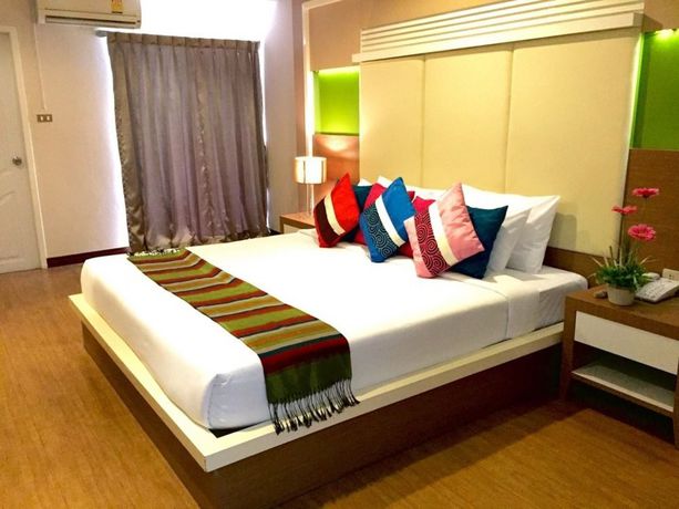 Imagen de la habitación del Hotel Charoenchit House. Foto 12