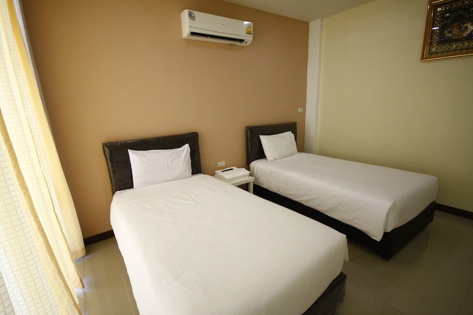 Imagen de la habitación del Hotel Charoensuk Grand. Foto 4
