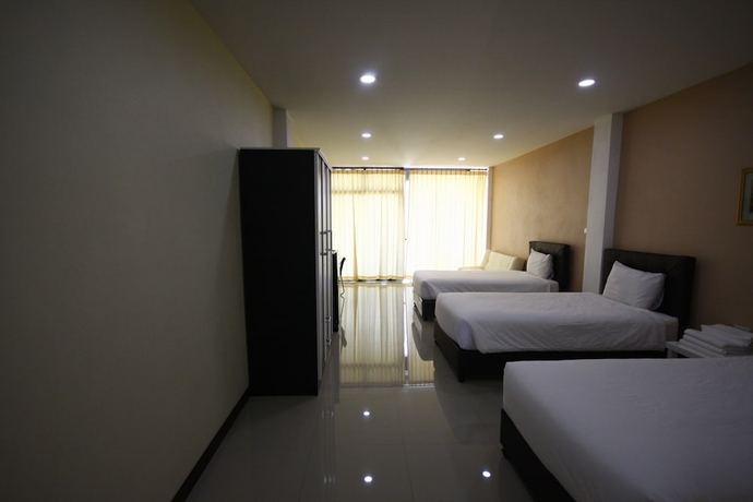 Imagen de la habitación del Hotel Charoensuk Grand. Foto 9
