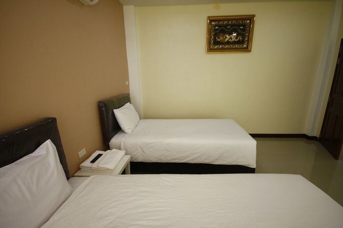 Imagen de la habitación del Hotel Charoensuk Grand. Foto 11