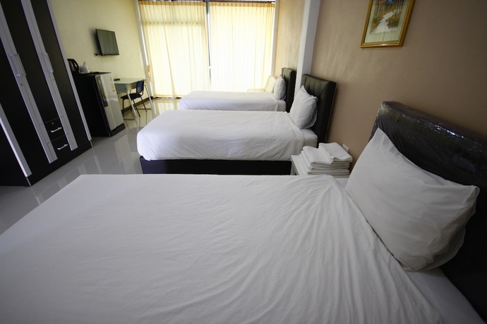 Imagen de la habitación del Hotel Charoensuk Grand. Foto 12