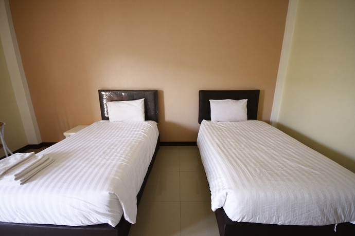 Imagen de la habitación del Hotel Charoensuk Grand. Foto 16