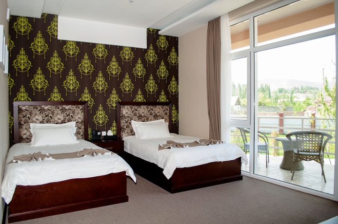 Imagen de la habitación del Hotel Charos Deluxe Resort. Foto 9