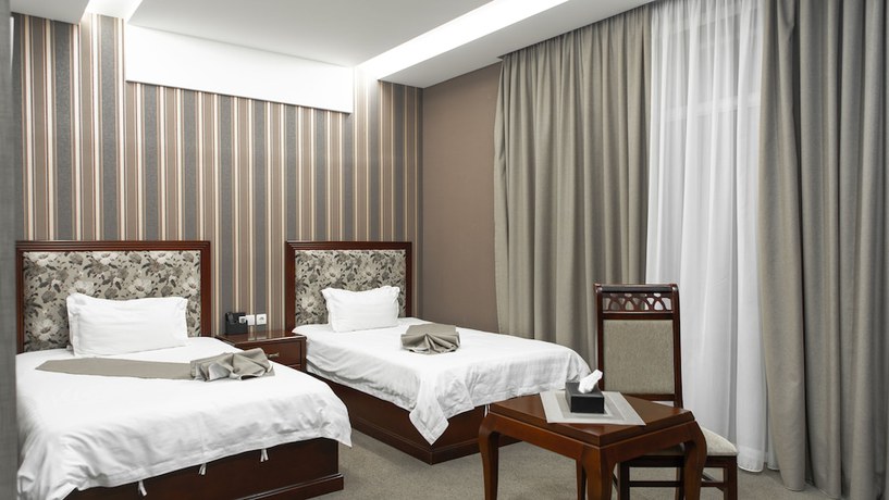 Imagen de la habitación del Hotel Charos Deluxe Resort. Foto 18