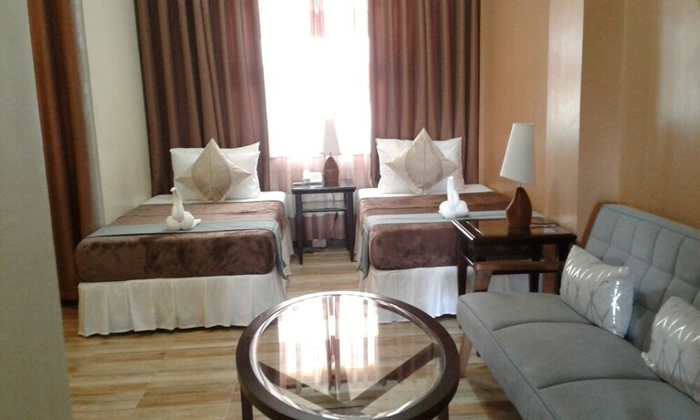 Imagen de la habitación del Hotel Charo's Dormitel. Foto 13