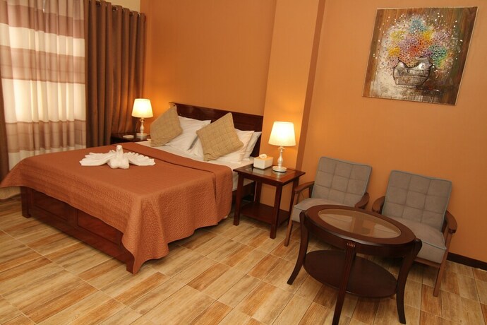 Imagen de la habitación del Hotel Charo's Dormitel. Foto 16