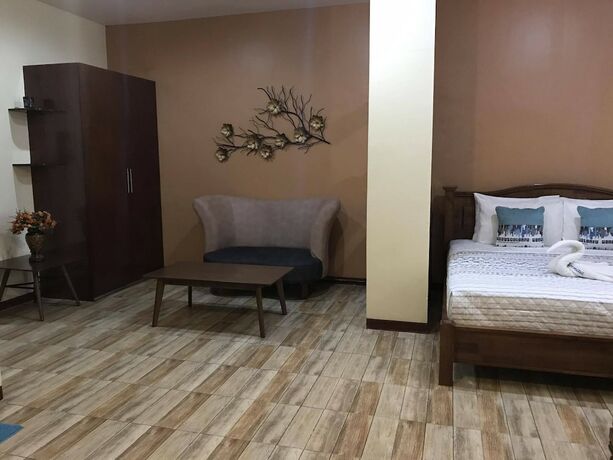 Imagen de la habitación del Hotel Charo's Dormitel. Foto 17