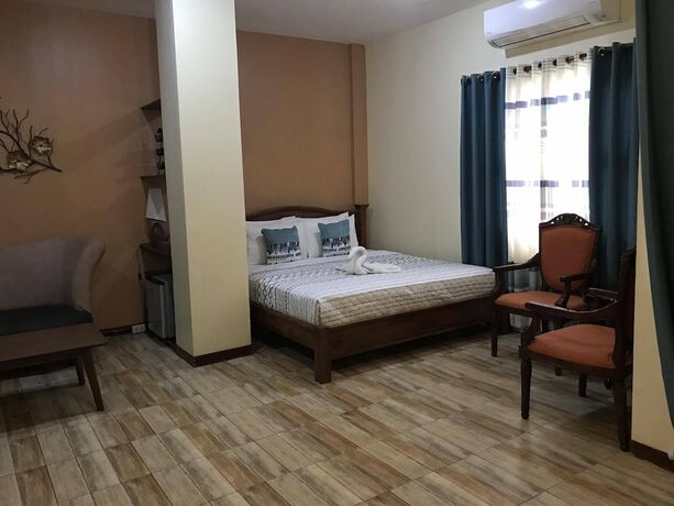 Imagen de la habitación del Hotel Charo's Dormitel. Foto 20