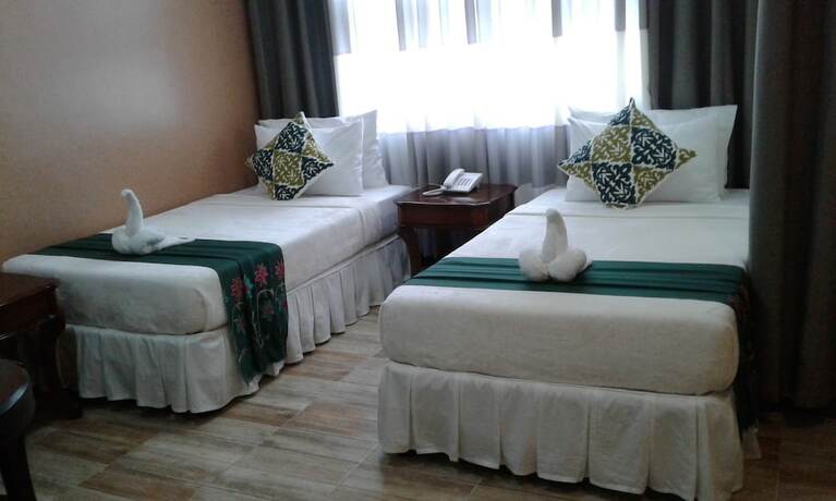 Imagen de la habitación del Hotel Charo's Dormitel. Foto 26