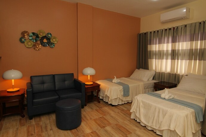 Imagen de la habitación del Hotel Charo's Dormitel. Foto 27