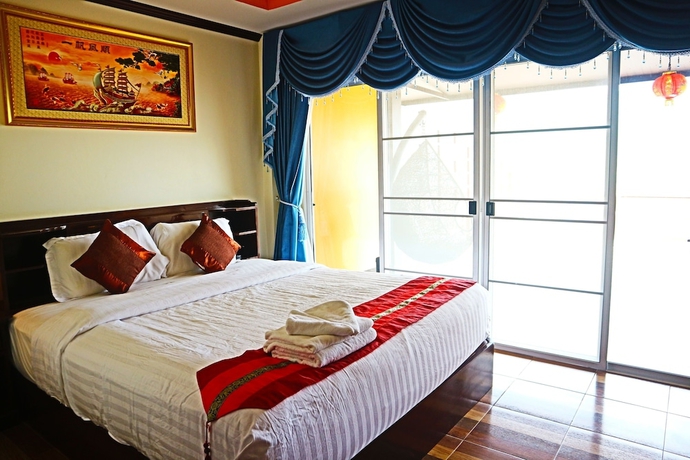 Imagen de la habitación del Hotel Chasa Rakthai Resort. Foto 9