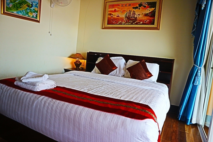 Imagen de la habitación del Hotel Chasa Rakthai Resort. Foto 15