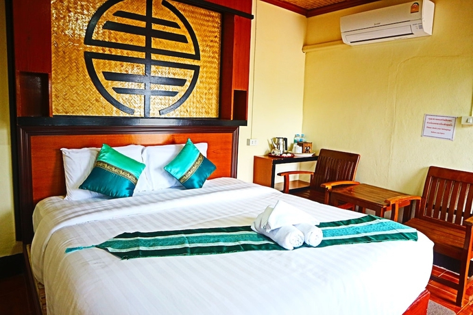 Imagen de la habitación del Hotel Chasa Rakthai Resort. Foto 17