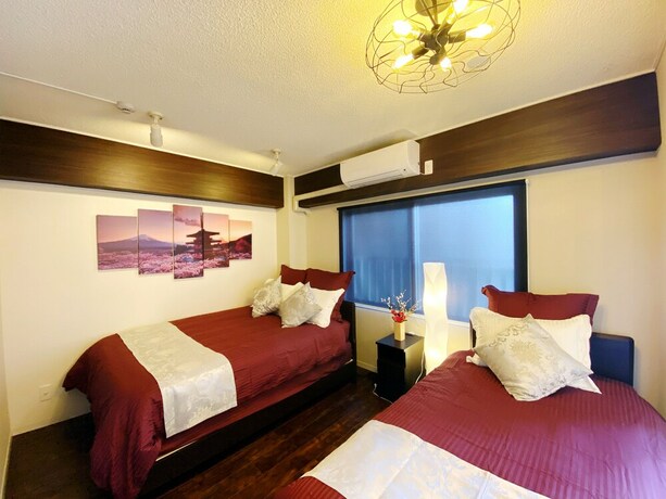 Imagen de la habitación del Hotel Chatan Tall House. Foto 19
