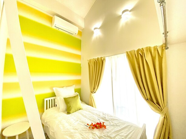 Imagen de la habitación del Hotel Chatan Tall House. Foto 31