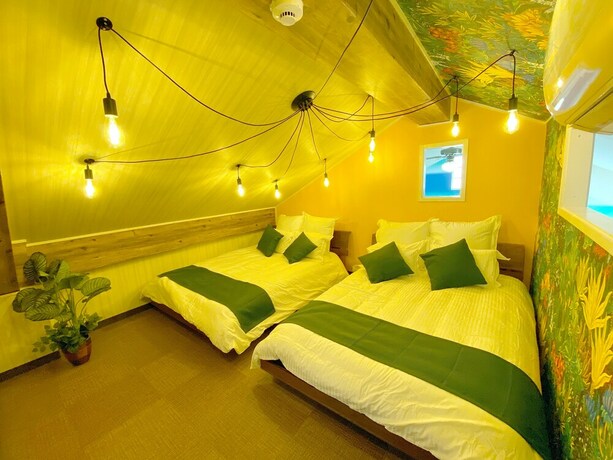 Imagen de la habitación del Hotel Chatan Tall House. Foto 35
