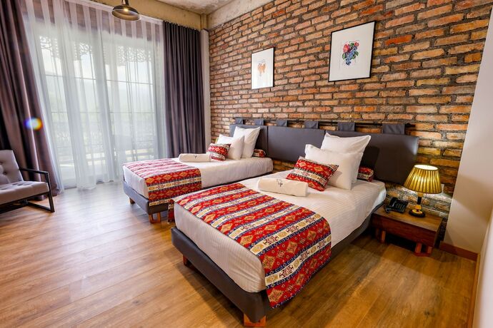 Imagen de la habitación del Hotel Chateau Artwine. Foto 12