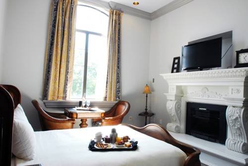 Imagen de la habitación del Hotel Chateau Avalon. Foto 2