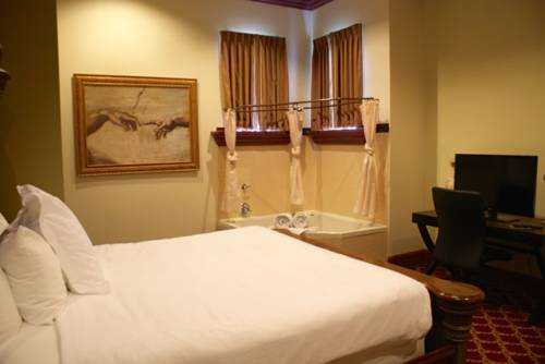 Imagen de la habitación del Hotel Chateau Avalon. Foto 11