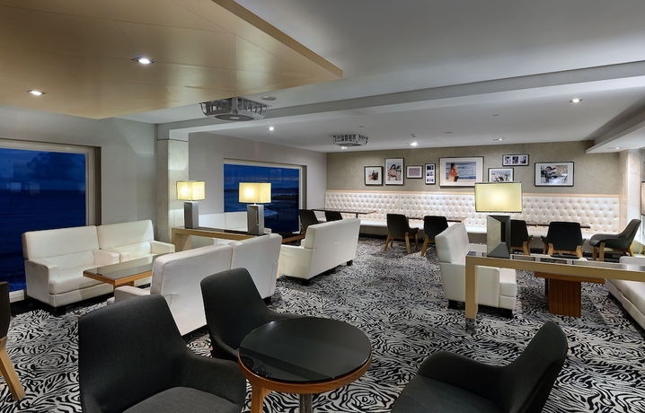 Imagen del bar/restaurante del Hotel Chateau Beach Resort. Foto 3