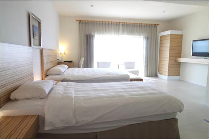 Imagen de la habitación del Hotel Chateau Beach Resort. Foto 14