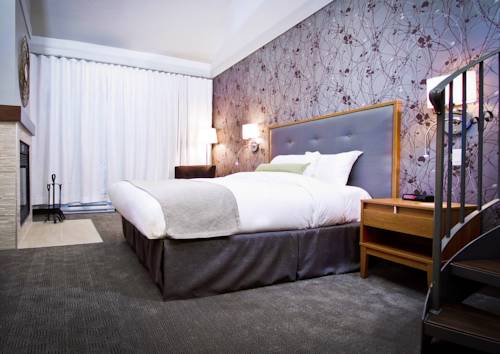 Imagen de la habitación del Hotel Chateau Bromont. Foto 12