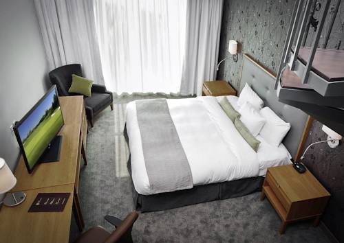 Imagen de la habitación del Hotel Chateau Bromont. Foto 13